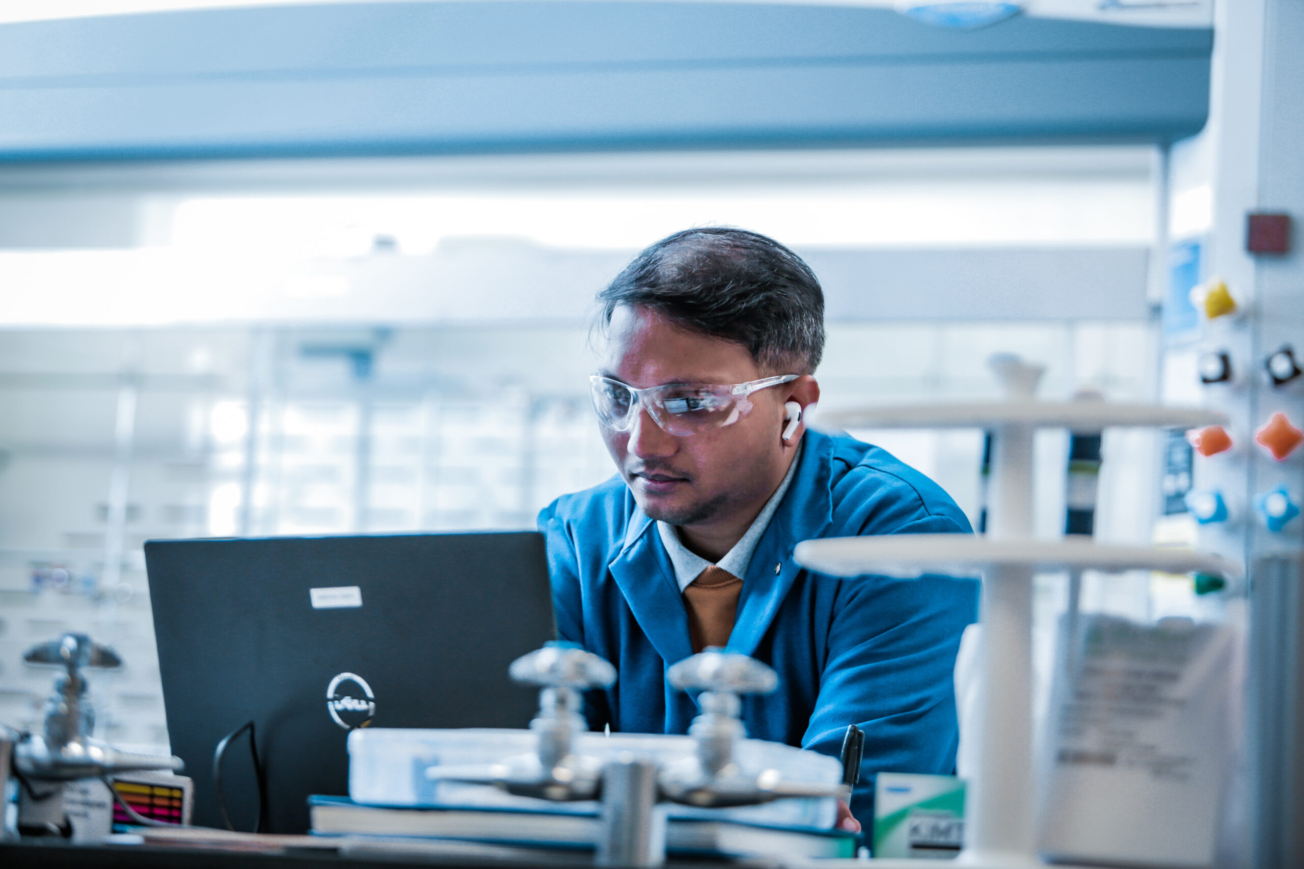 Diverse Talent Man is looking at computer