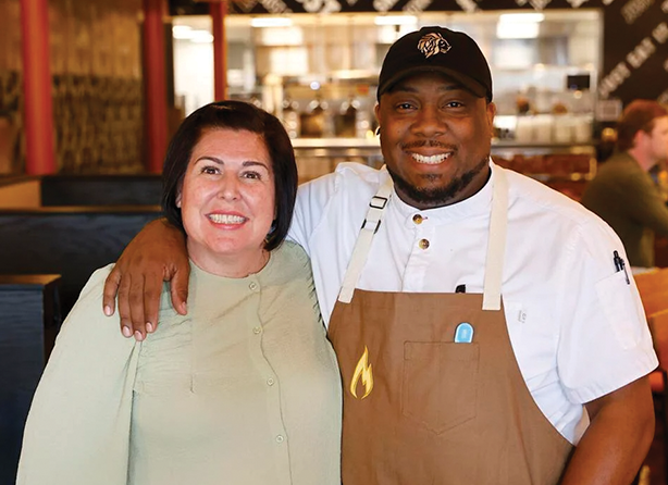 Lindsey Food Group Man and woman standing in restaurant